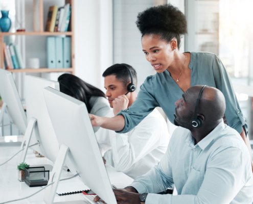 crm-black-people-or-manager-in-call-center-coachi-2023-02-25-00-30-32-utc-495x400.jpg